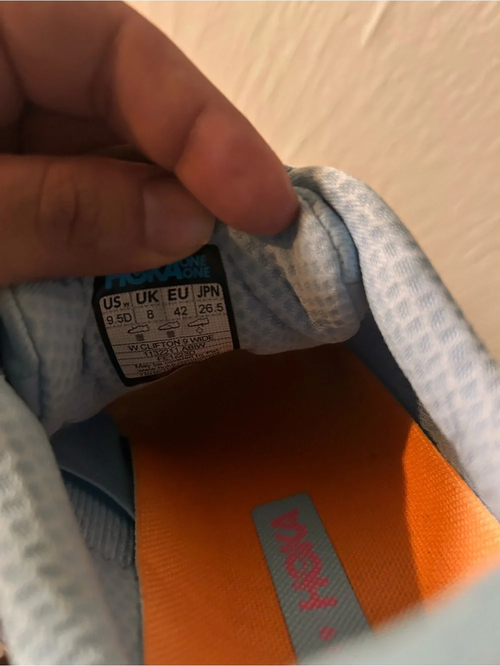 Hoka women Running Sneaker in Light Blue with Orange Accents 9.5D wide
